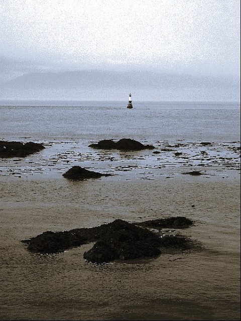 Leuchtturm im blauen Meer, Sascha Bernard